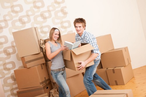 Professional movers loading furniture in Uxbridge